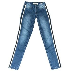 Blue stretchy skinny jeans with black and white stripes